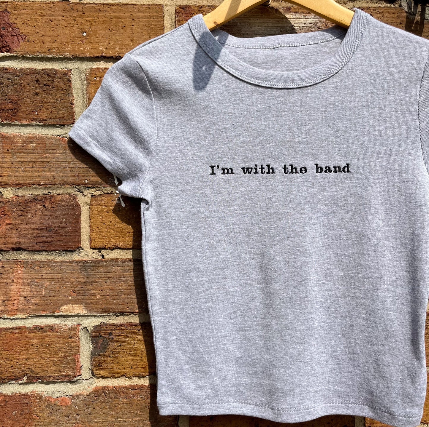 I’m with the band Embroidered Baby Tee
